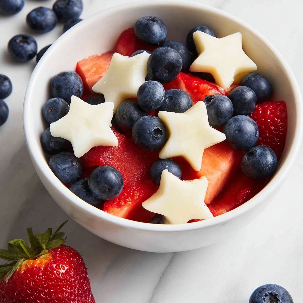 4th of July Fruit Salad with Apple Stars, Strawberries, and Blueberries Recipe - Recipe Image